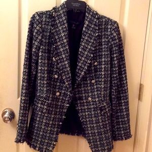 Woven blazer with silver thread.